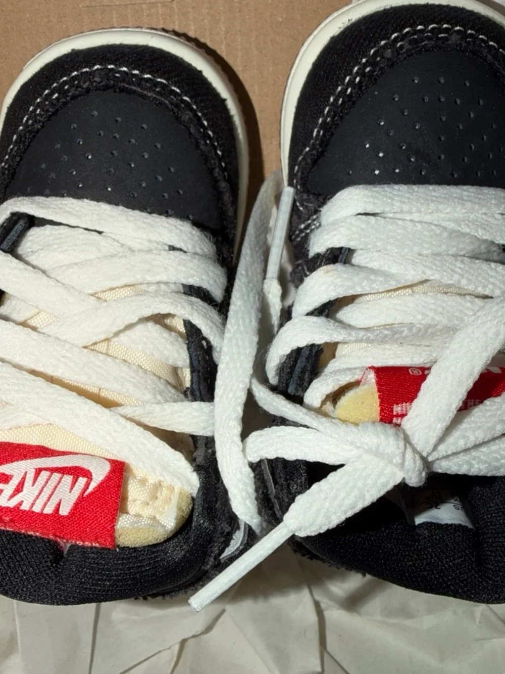 Nike Kids Black and White High-Top Sneakers with Red Accent